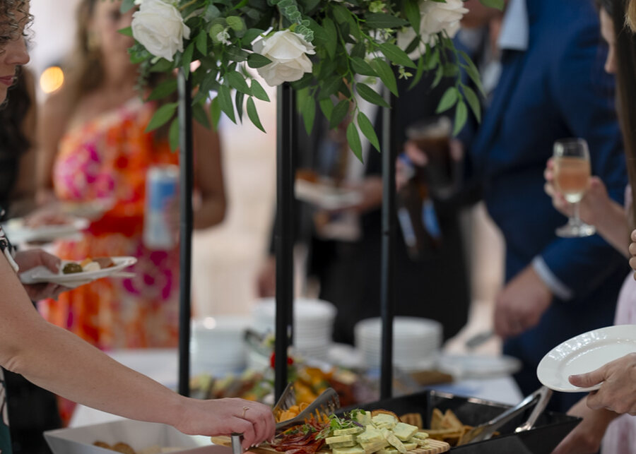A grazing board and florals at a party
