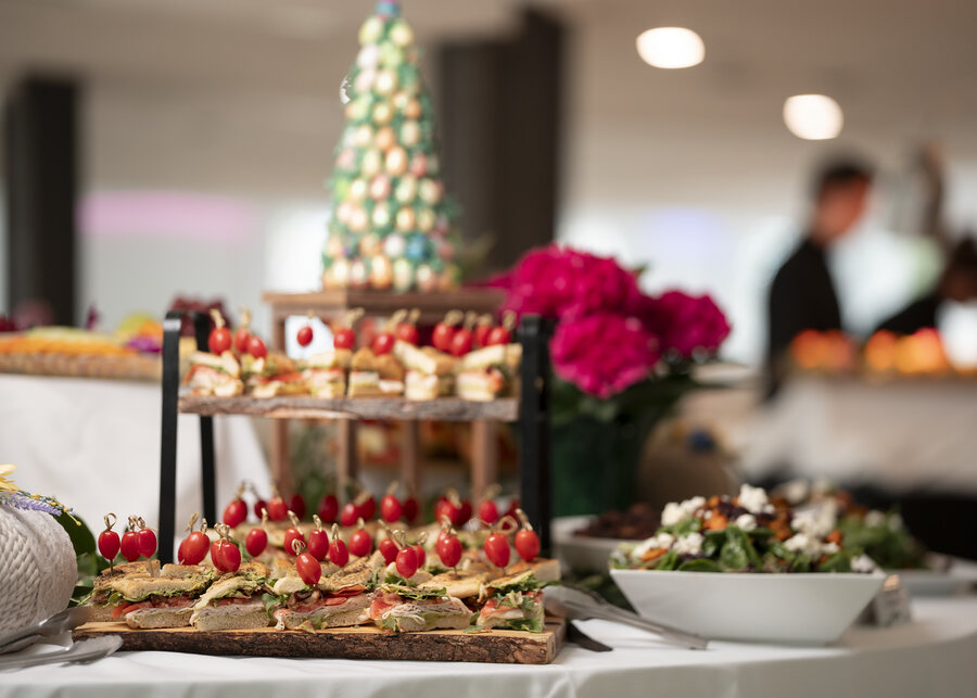 Brunch table with tea sandwiches and salad